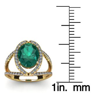 2 3/4 Carat Oval Shape Emerald and Halo Diamond Ring In 14 Karat Yellow Gold