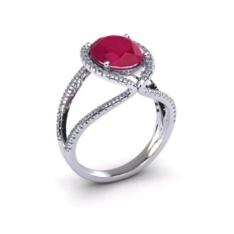 3 1/2 Carat Oval Shape Ruby and Halo Diamond Ring In 14 Karat White Gold