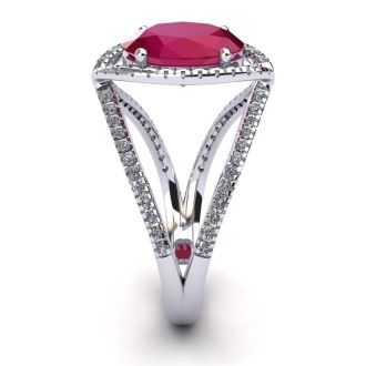 3 1/2 Carat Oval Shape Ruby and Halo Diamond Ring In 14 Karat White Gold