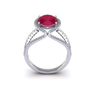3 1/2 Carat Oval Shape Ruby and Halo Diamond Ring In 14 Karat White Gold