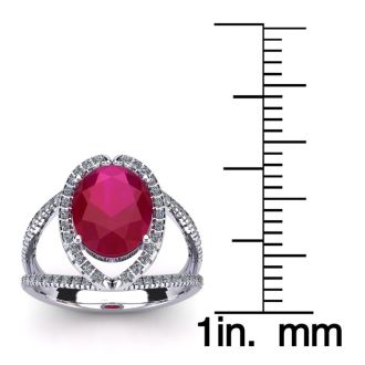 3 1/2 Carat Oval Shape Ruby and Halo Diamond Ring In 14 Karat White Gold