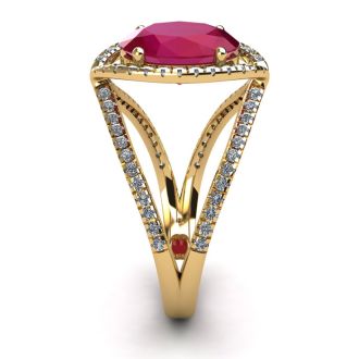 3 1/2 Carat Oval Shape Ruby and Halo Diamond Ring In 14 Karat Yellow Gold