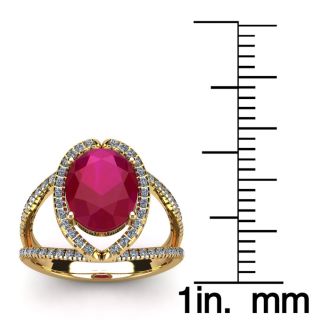 3 1/2 Carat Oval Shape Ruby and Halo Diamond Ring In 14 Karat Yellow Gold