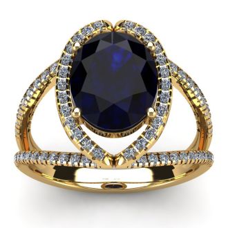 3 1/2 Carat Oval Shape Sapphire and Halo Diamond Ring In 14 Karat Yellow Gold