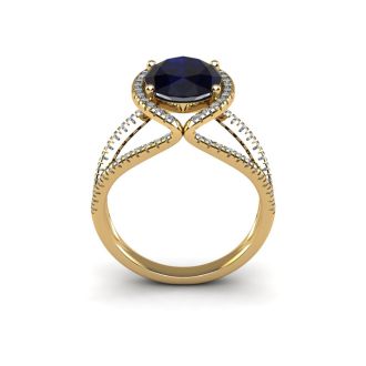 3 1/2 Carat Oval Shape Sapphire and Halo Diamond Ring In 14 Karat Yellow Gold