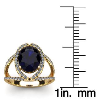 3 1/2 Carat Oval Shape Sapphire and Halo Diamond Ring In 14 Karat Yellow Gold