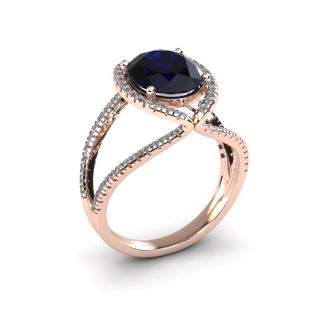 3 1/2 Carat Oval Shape Sapphire and Halo Diamond Ring In 14 Karat Rose Gold