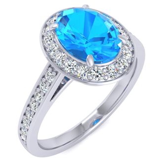 1 3/4 Carat Oval Shape Blue Topaz and Halo Diamond Ring In 14 Karat White Gold