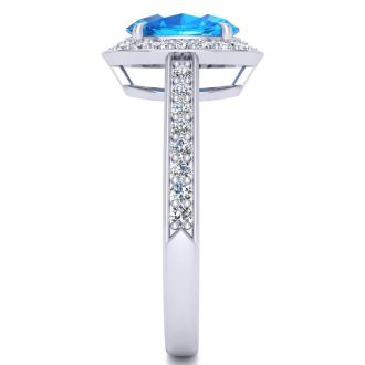 1 3/4 Carat Oval Shape Blue Topaz and Halo Diamond Ring In 14 Karat White Gold