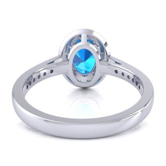 1 3/4 Carat Oval Shape Blue Topaz and Halo Diamond Ring In 14 Karat White Gold