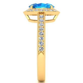 1 3/4 Carat Oval Shape Blue Topaz and Halo Diamond Ring In 14 Karat Yellow Gold