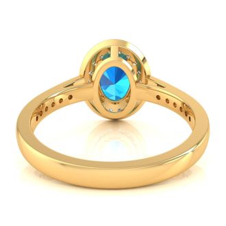 1 3/4 Carat Oval Shape Blue Topaz and Halo Diamond Ring In 14 Karat Yellow Gold