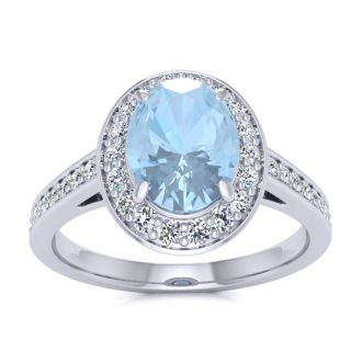 Aquamarine Ring: Aquamarine Jewelry: 1 1/2 Carat Oval Shape Aquamarine and Halo Diamond Ring In 14 Karat White Gold