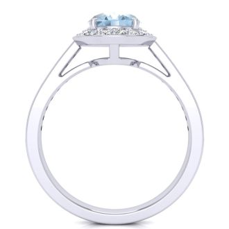 Aquamarine Ring: Aquamarine Jewelry: 1 1/2 Carat Oval Shape Aquamarine and Halo Diamond Ring In 14 Karat White Gold