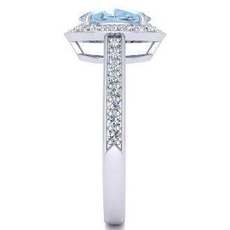 Aquamarine Ring: Aquamarine Jewelry: 1 1/2 Carat Oval Shape Aquamarine and Halo Diamond Ring In 14 Karat White Gold