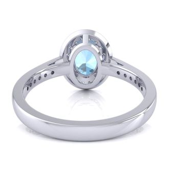 Aquamarine Ring: Aquamarine Jewelry: 1 1/2 Carat Oval Shape Aquamarine and Halo Diamond Ring In 14 Karat White Gold