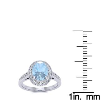 Aquamarine Ring: Aquamarine Jewelry: 1 1/2 Carat Oval Shape Aquamarine and Halo Diamond Ring In 14 Karat White Gold