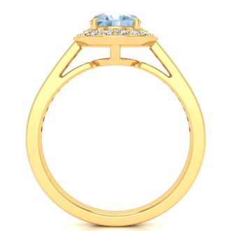 Aquamarine Ring: Aquamarine Jewelry: 1 1/2 Carat Oval Shape Aquamarine and Halo Diamond Ring In 14 Karat Yellow Gold