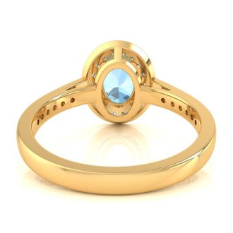 Aquamarine Ring: Aquamarine Jewelry: 1 1/2 Carat Oval Shape Aquamarine and Halo Diamond Ring In 14 Karat Yellow Gold