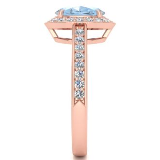 Aquamarine Ring: Aquamarine Jewelry: 1 1/2 Carat Oval Shape Aquamarine and Halo Diamond Ring In 14 Karat Rose Gold