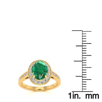 1 1/2 Carat Oval Shape Emerald and Halo Diamond Ring In 14 Karat Yellow Gold