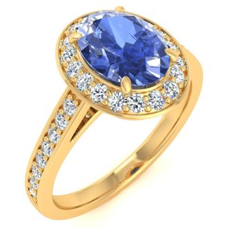 1 1/2 Carat Oval Shape Tanzanite and Halo Diamond Ring In 14 Karat Yellow Gold