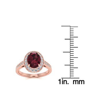 1 3/4 Carat Oval Shape Garnet and Halo Diamond Ring In 14 Karat Rose Gold