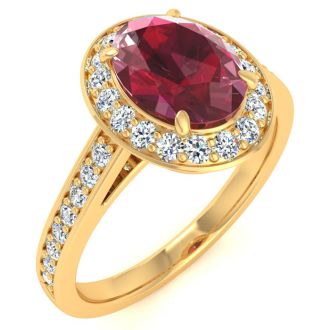 1 3/4 Carat Oval Shape Ruby and Halo Diamond Ring In 14 Karat Yellow Gold