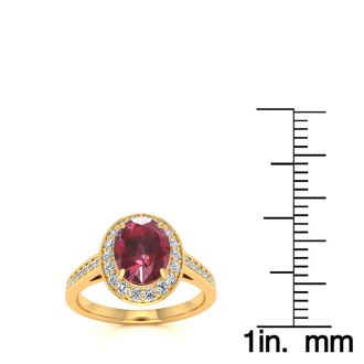 1 3/4 Carat Oval Shape Ruby and Halo Diamond Ring In 14 Karat Yellow Gold