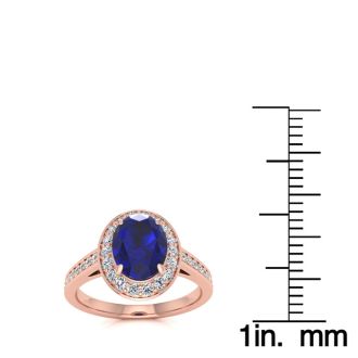 1 3/4 Carat Oval Shape Sapphire and Halo Diamond Ring In 14 Karat Rose Gold