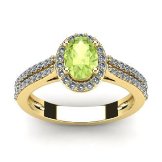 1 1/3 Carat Oval Shape Peridot and Halo Diamond Ring In 14 Karat Yellow Gold