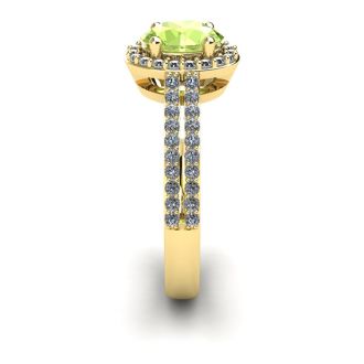 1 1/3 Carat Oval Shape Peridot and Halo Diamond Ring In 14 Karat Yellow Gold
