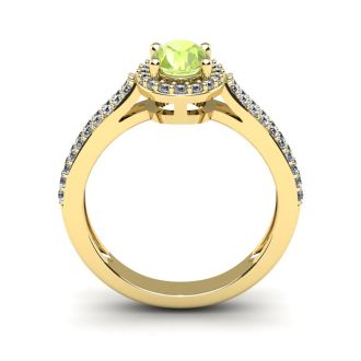1 1/3 Carat Oval Shape Peridot and Halo Diamond Ring In 14 Karat Yellow Gold