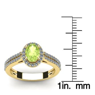 1 1/3 Carat Oval Shape Peridot and Halo Diamond Ring In 14 Karat Yellow Gold
