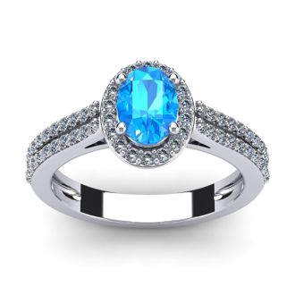 1 1/2 Carat Oval Shape Blue Topaz and Halo Diamond Ring In 14 Karat White Gold