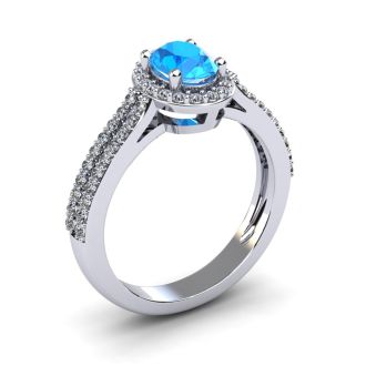 1 1/2 Carat Oval Shape Blue Topaz and Halo Diamond Ring In 14 Karat White Gold