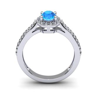 1 1/2 Carat Oval Shape Blue Topaz and Halo Diamond Ring In 14 Karat White Gold