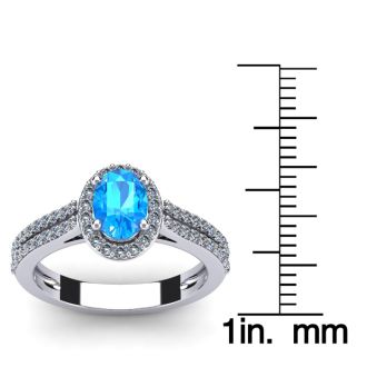 1 1/2 Carat Oval Shape Blue Topaz and Halo Diamond Ring In 14 Karat White Gold