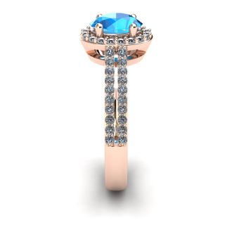 1 1/2 Carat Oval Shape Blue Topaz and Halo Diamond Ring In 14 Karat Rose Gold