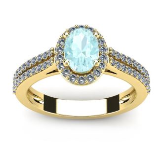 1 1/4 Carat Oval Shape Aquamarine and Halo Diamond Ring In 14 Karat Yellow Gold