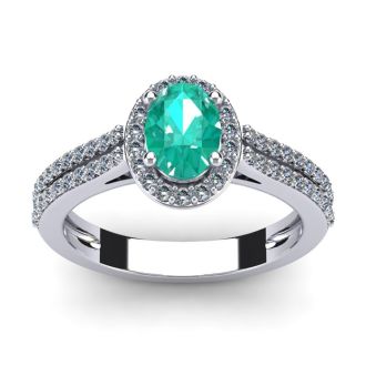 1 1/4 Carat Oval Shape Emerald and Halo Diamond Ring In 14 Karat White Gold