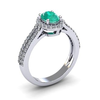 1 1/4 Carat Oval Shape Emerald and Halo Diamond Ring In 14 Karat White Gold