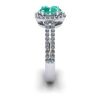 1 1/4 Carat Oval Shape Emerald and Halo Diamond Ring In 14 Karat White Gold
