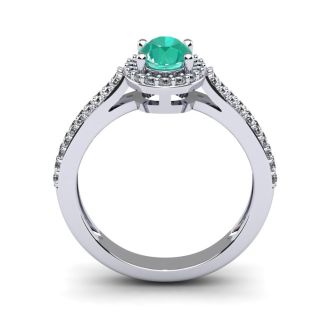 1 1/4 Carat Oval Shape Emerald and Halo Diamond Ring In 14 Karat White Gold