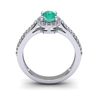 1 1/4 Carat Oval Shape Emerald and Halo Diamond Ring In 14 Karat White Gold