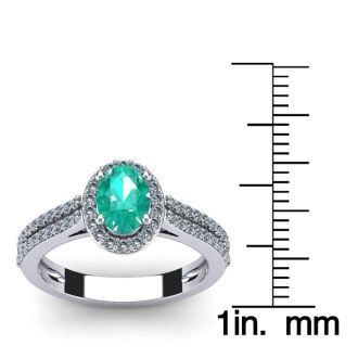 1 1/4 Carat Oval Shape Emerald and Halo Diamond Ring In 14 Karat White Gold