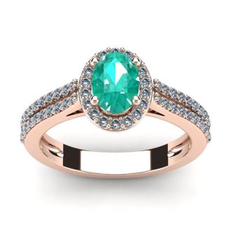 1 1/4 Carat Oval Shape Emerald and Halo Diamond Ring In 14 Karat Rose Gold