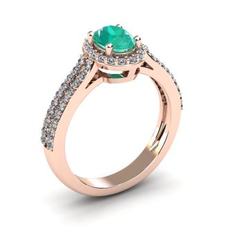 1 1/4 Carat Oval Shape Emerald and Halo Diamond Ring In 14 Karat Rose Gold