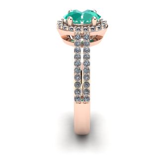 1 1/4 Carat Oval Shape Emerald and Halo Diamond Ring In 14 Karat Rose Gold
