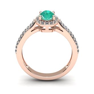 1 1/4 Carat Oval Shape Emerald and Halo Diamond Ring In 14 Karat Rose Gold